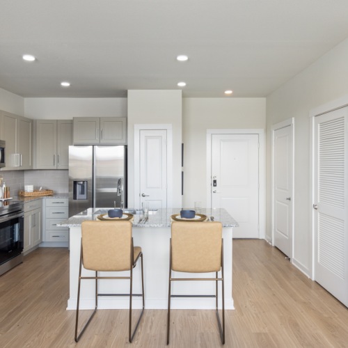 Open Concept Kitchen Island with Smart Stainless Steel Appliances