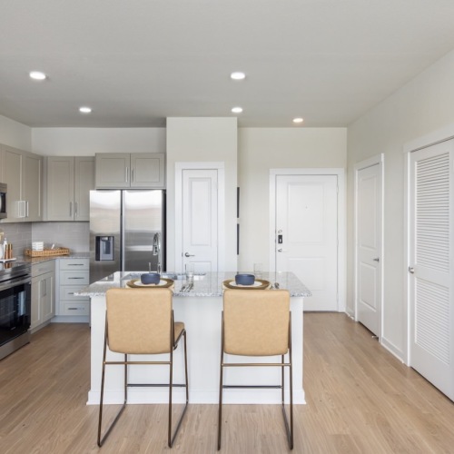 Open Concept Kitchen Island with Smart Stainless Steel Appliances