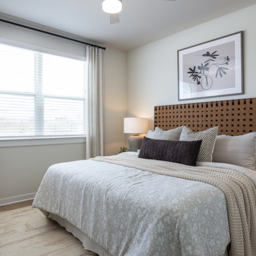 Spacious Bedroom with Large Windows & Natural Light