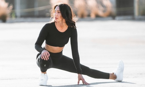 Entertainment & Recreational a woman stretching outdoors