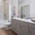 a bathroom with a tub sink and toilet